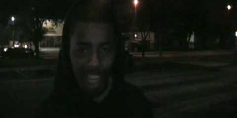 J Will spitting a verse in front of the U of H Stadium